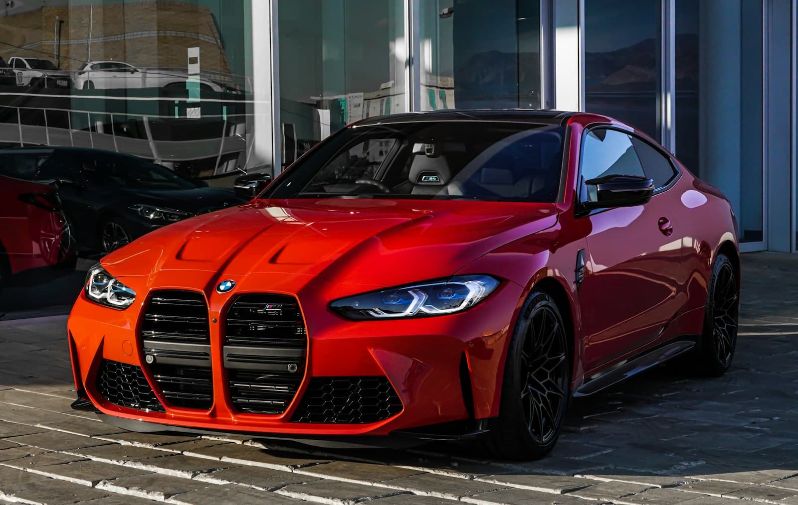 Glossy red performance coupe with polished finish